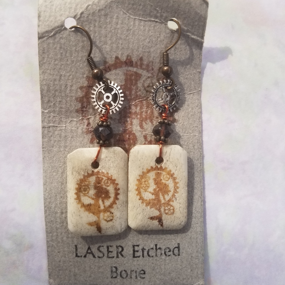Mermaid laser etched handmade pierced earrings.